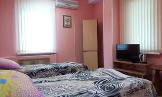 Гостиница Filin i Sova Mini Hotel Владивосток Кровать в общем номере с 2 кроватями-2